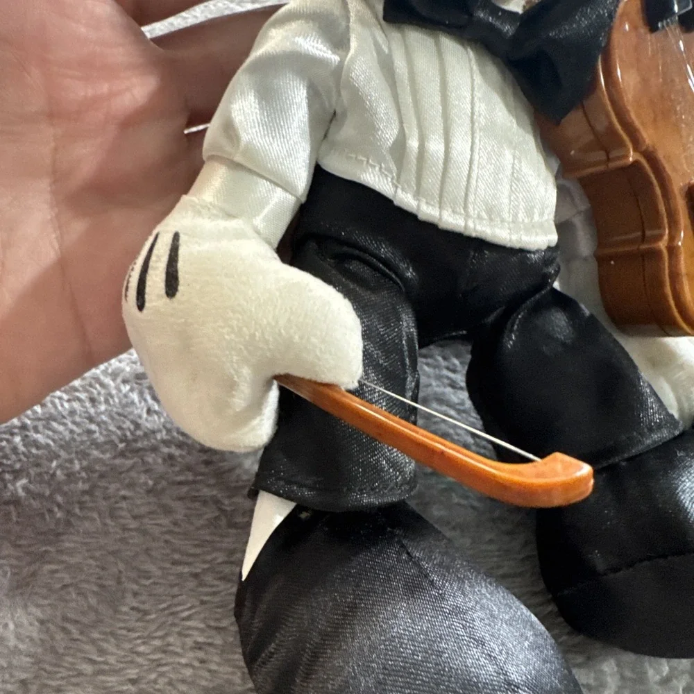 Mickey Mouse In A Tuxedo With A Violin Playing‎ A Violin